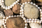 Collier de grosses perles blanches
